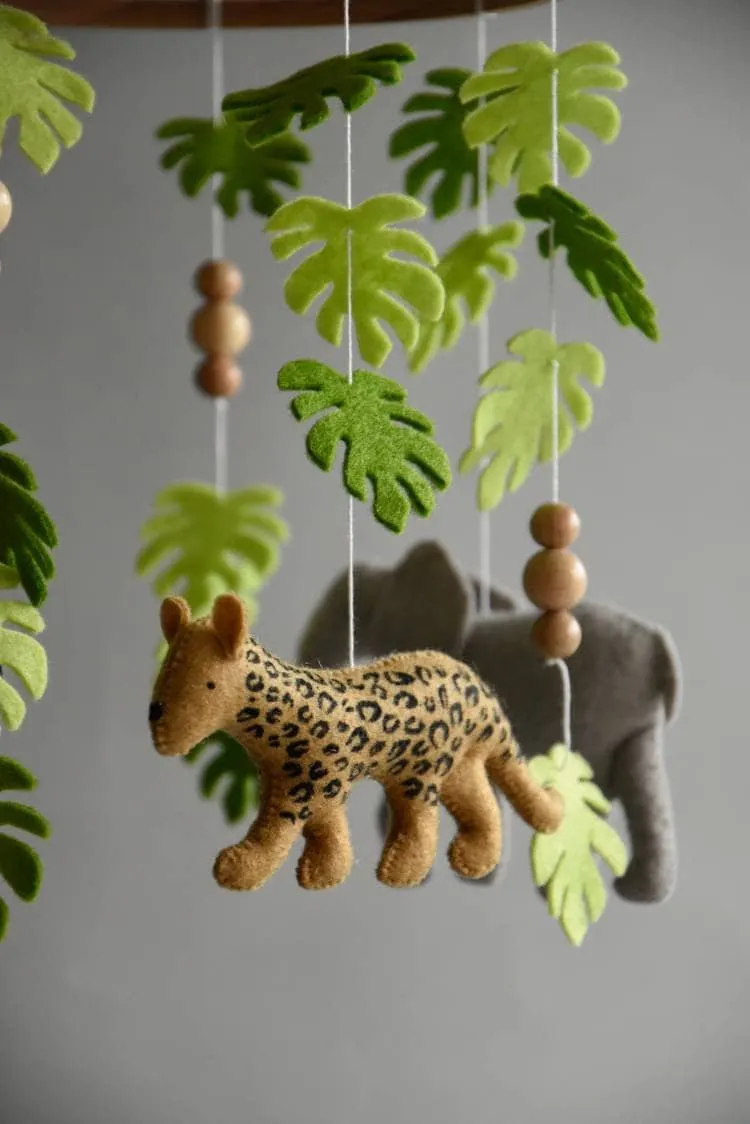 Safari mobile with giraffe, hippo, cheetah, elephant and wooden pearls