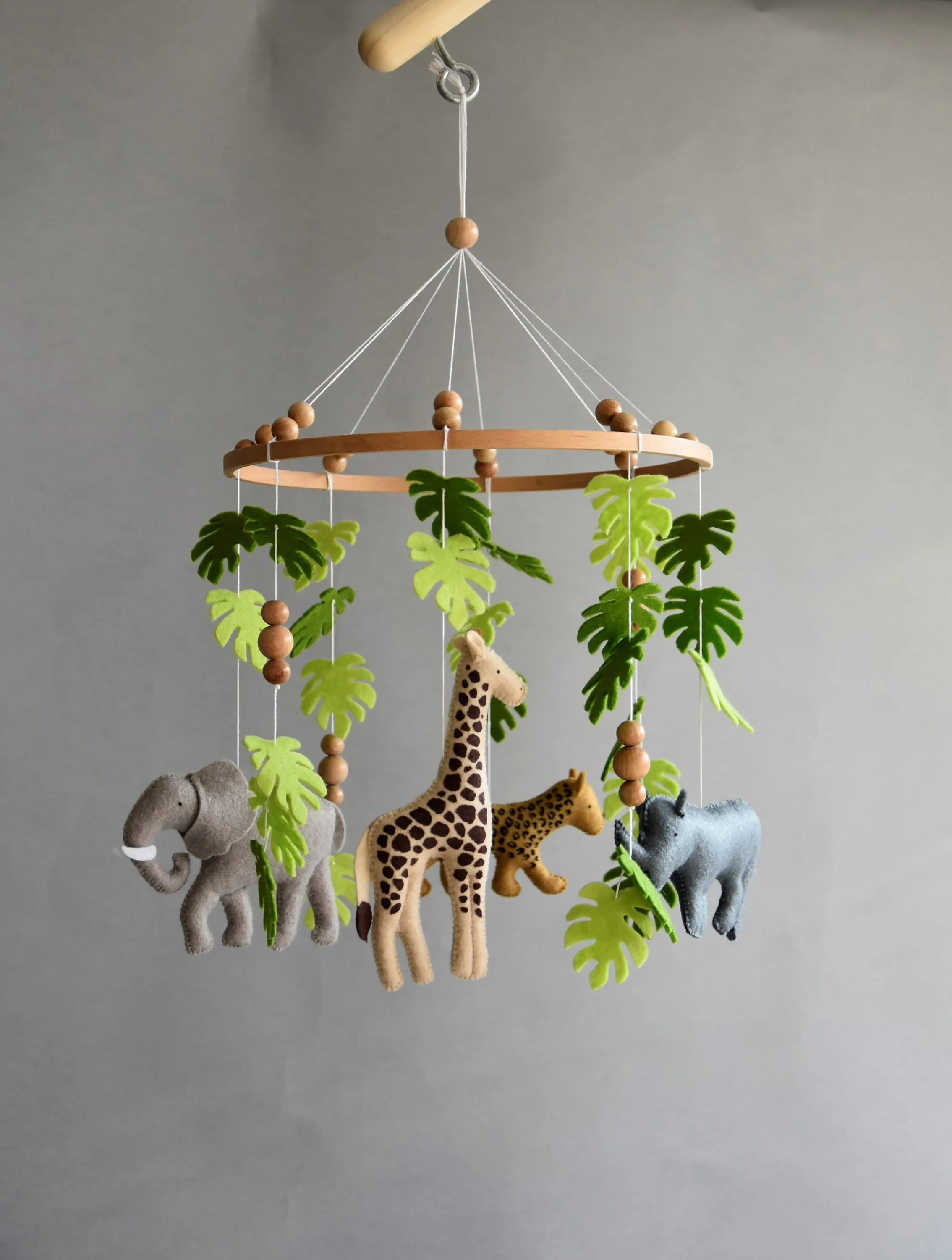 Safari mobile with giraffe, hippo, cheetah, elephant and wooden pearls